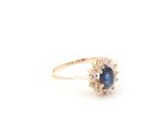 Diamant ring i 18k guld med en safir