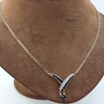 Halsband med diamanter och safirer i 14k guld