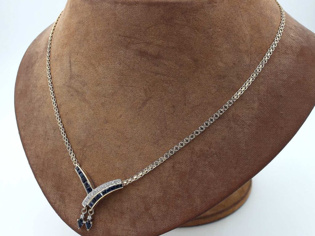 Halsband med diamanter och safirer i 14k guld