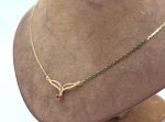 Halsband med en rubin i 18k guld