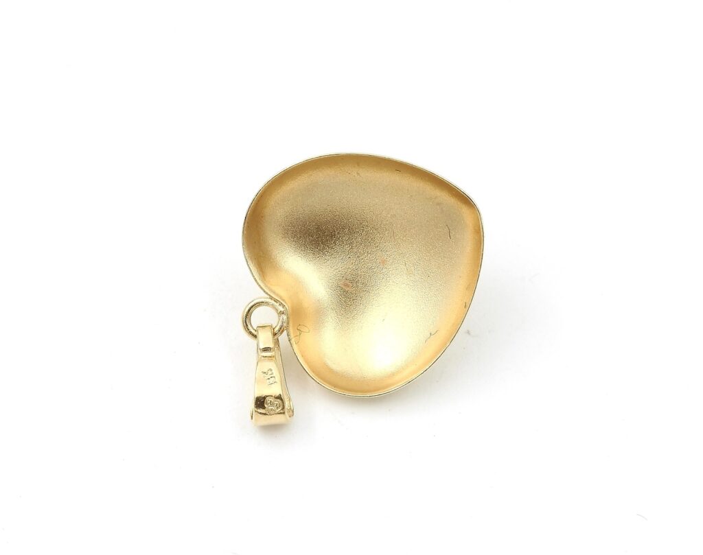 Diamant hänge i form av hjärta i 18k guld