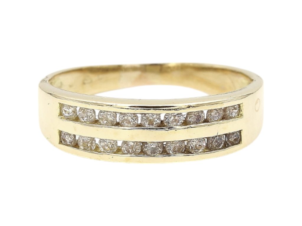Ring i 18k guld med zirkoner