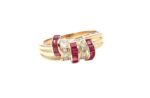 Ring i 18k guld med briljanter och rubiner