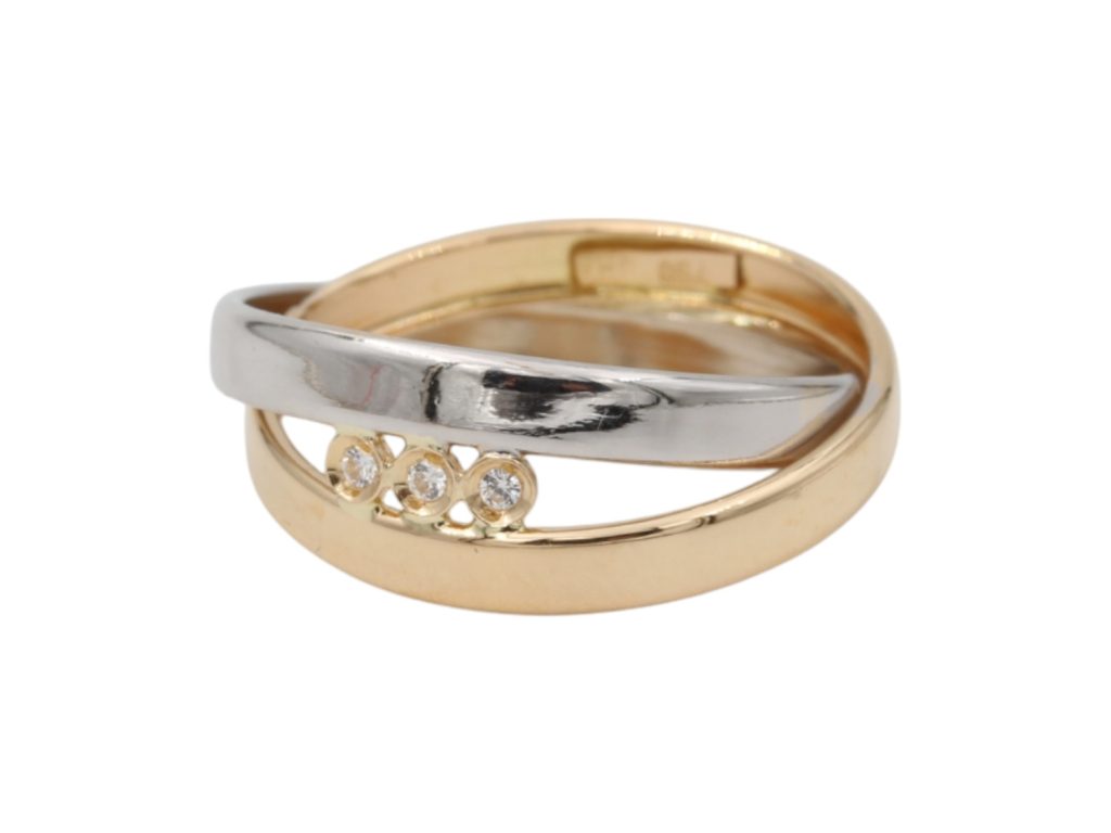 Ring i 18k guld med zirkoner