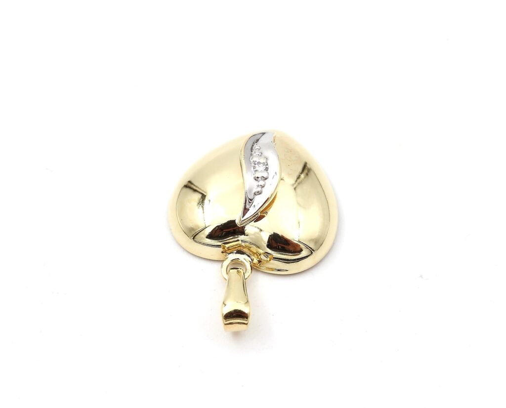 Diamant hänge i form av hjärta i 18k guld