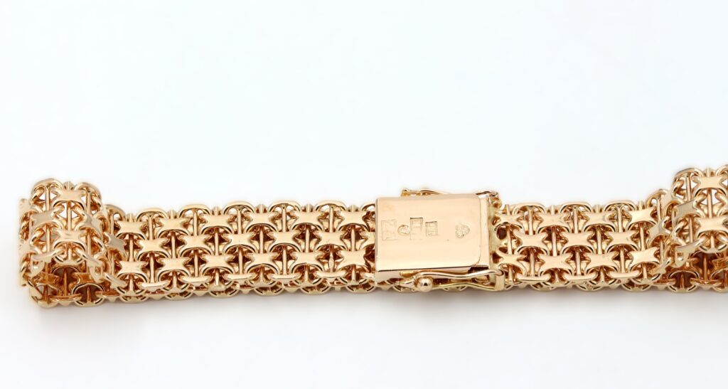 X-länk armband i 18k guld med stavar