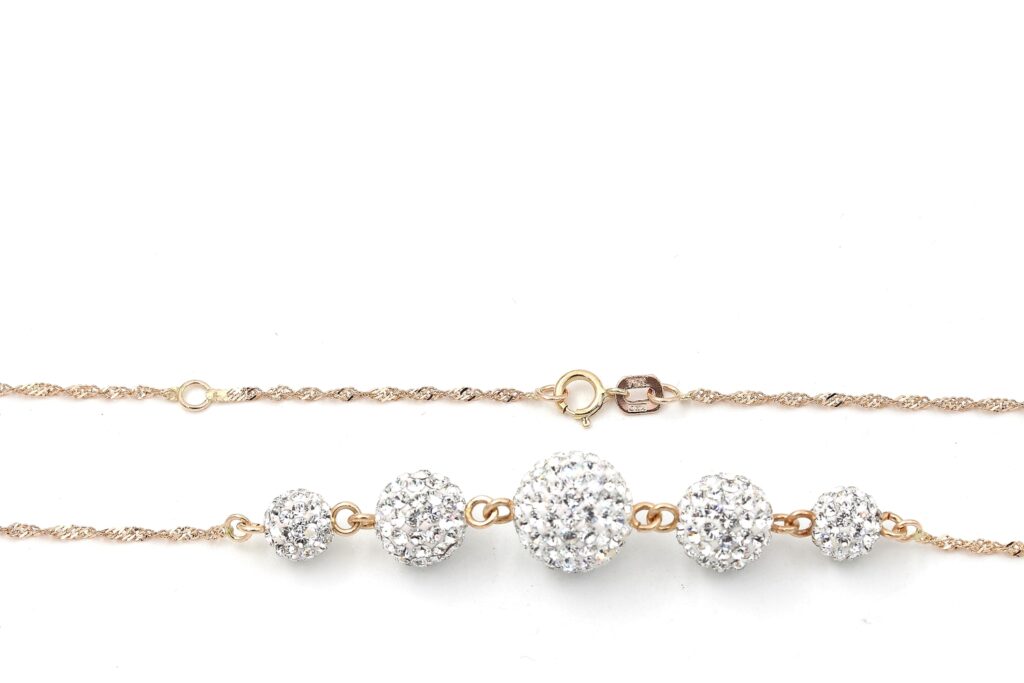 Halsband i 18k guld med zirkoner