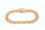 X-länk armband i 18k guld med stavar