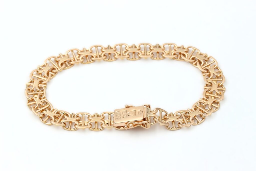 X-länk armband i 18k guld med stavar