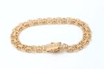 X-länk armband i 18k guld med stavar