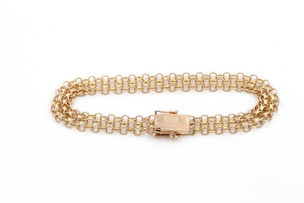 X-länk armband i 18k guld.Vikt 9.75g X-länk armband i 18k guld.Vikt 9.75g