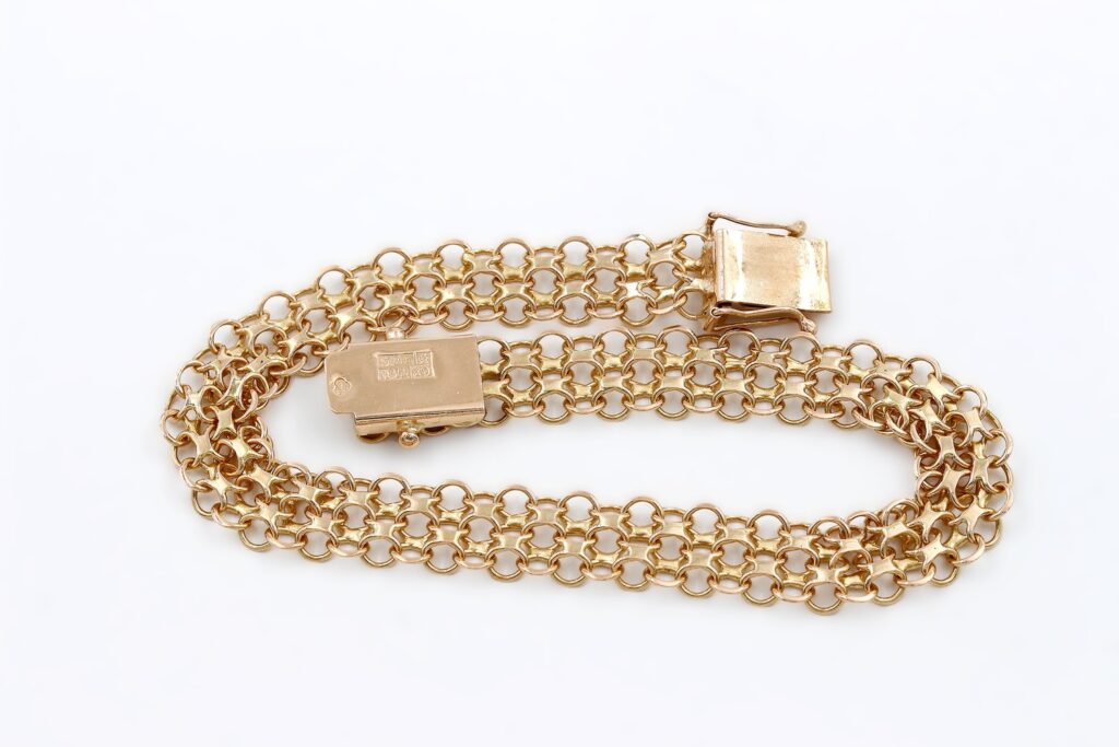 X-länk armband i 18k guld.Vikt 9.75g X-länk armband i 18k guld.Vikt 9.75g