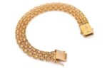X-länk armband i 18k guld med stavar.vikt 14.53 g