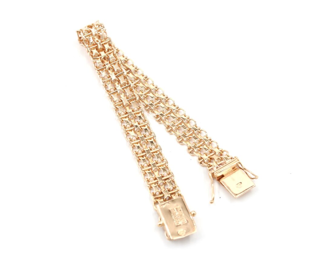 X-länk armband med stavar i 18k guld. Vikt: 16,25 g X-länk armband med stavar i 18k guld. Vikt: 16,25 g