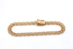 X-länk armband i 18k guld med stavar.vikt 6.59 g