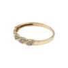 Ring i 18k guld med små diamanter
