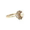 Diamantring i 18k guld 0,12 ct med en pärla