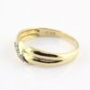 Ring i 18k guld med 3st diamanter på totalt ca 0,03 ct