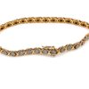 Armband i 18k guld med många små diamanter. Vikt:13.84g