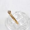 Ring i 18k guld med en liten diamant