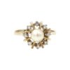 Diamantring i 18k guld 0,12 ct med en pärla