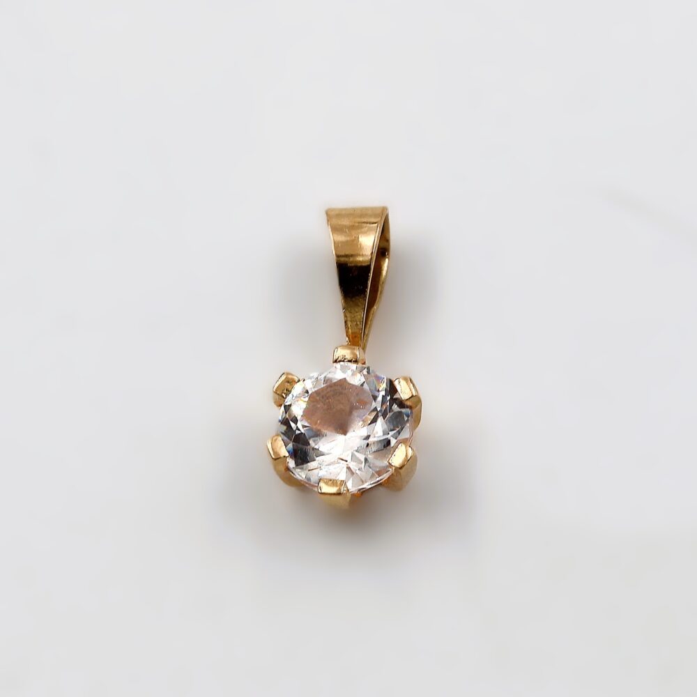 Hänge i 18k guld med en zirkon sten. Vikt 0.49g