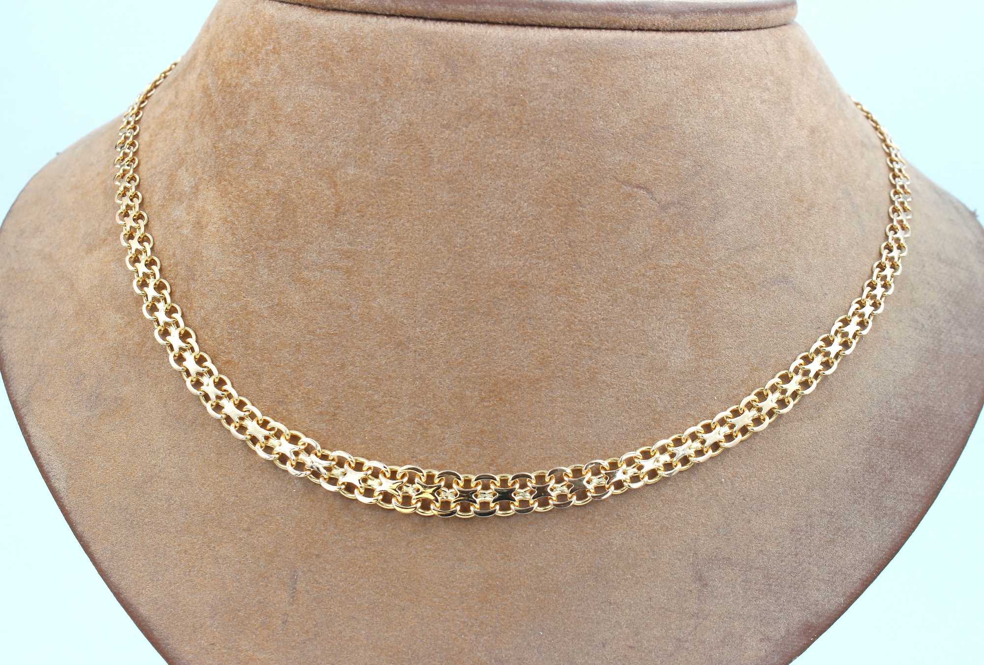 X-länk halsband doserad i 18k guld. vikt: 12,95g