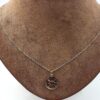 Pansar halsband i 18k guld med ett hänge