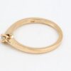 Ring i 18K guld med en diamant på ca 0.10 ct