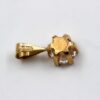 Hänge i 18k guld med en zirkon sten. Vikt 0.49g