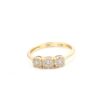 Ring i 18k guld med zirkon stenar