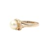 Diamantring i 18k guld 0,02 ct med en pärla