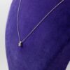 Halsband med ett diamant hänge i 18k vitguld på totalt ca 0,10 ct