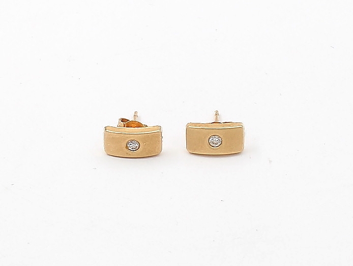 Örhängen i 18k guld med 2 vita stenar