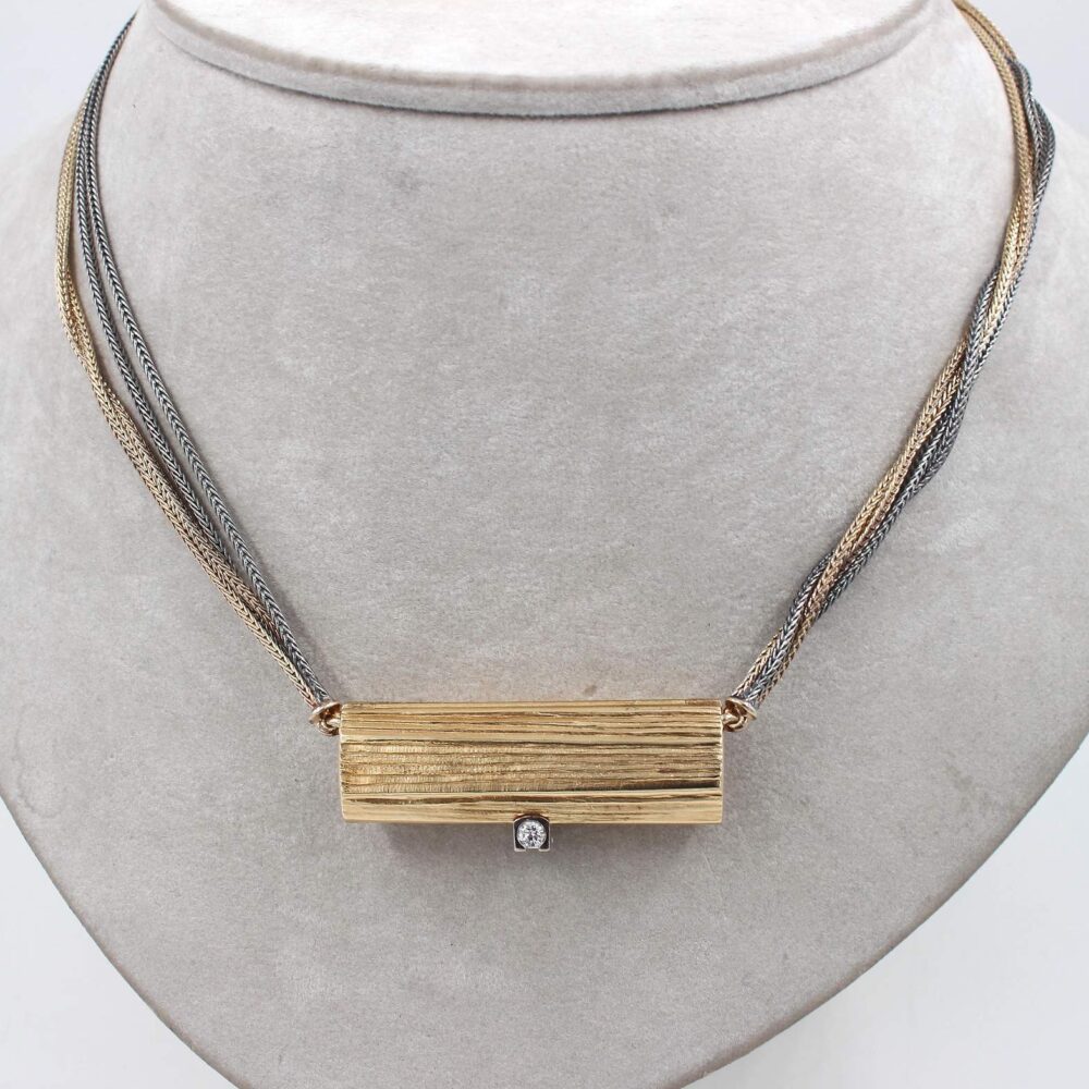 Ole Lynggaard halsband i 14k guld och sterling silver, diamanter på ca 0,12ct