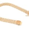 X-länk armband med stavar i 18k guld 3x. vikt: 13g