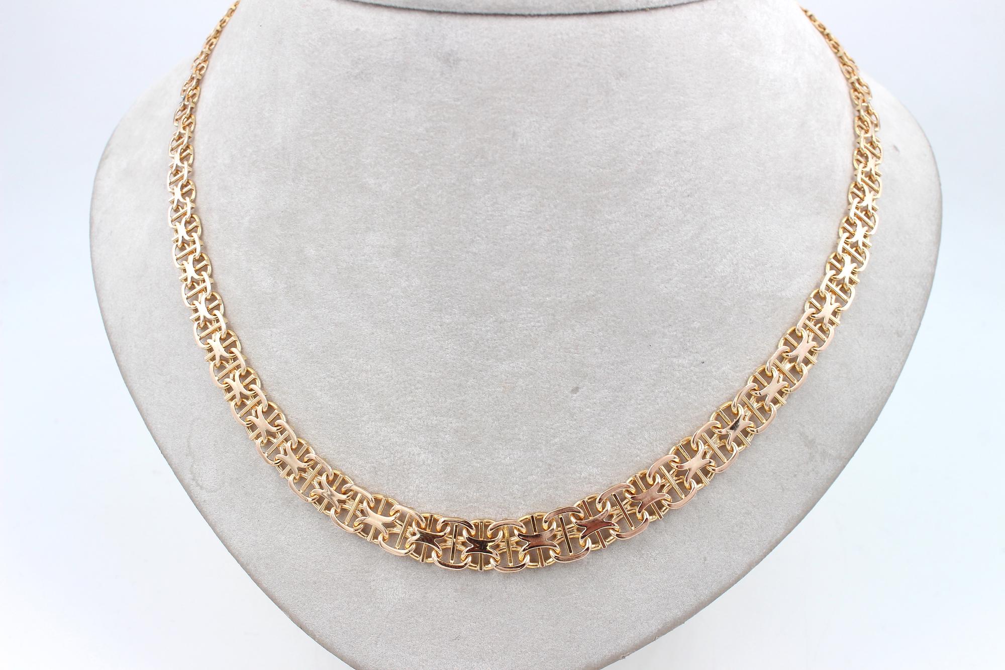 X-länk halsband med stavar i 18k guld. vikt: 25g