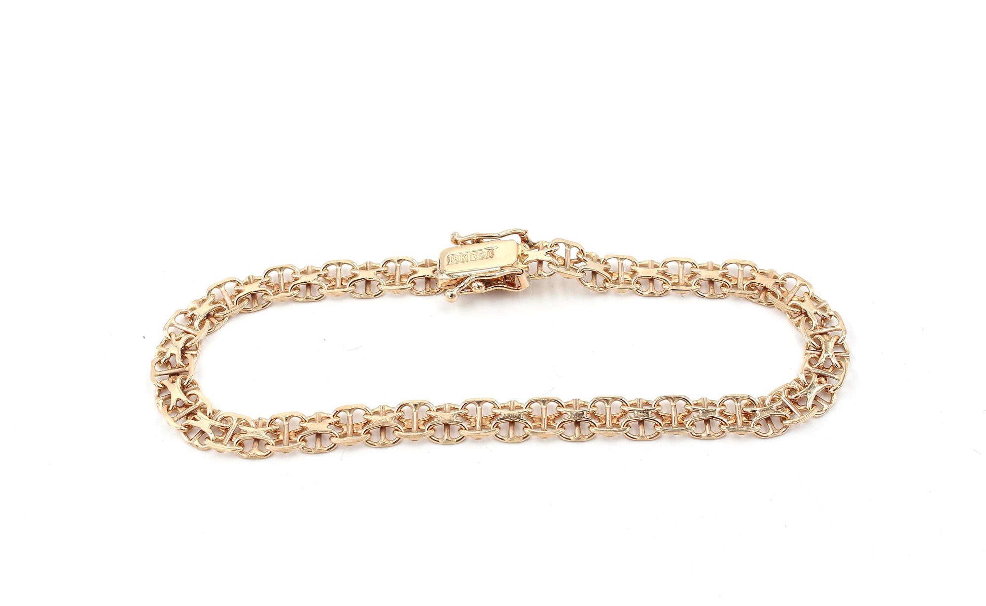 X-länk armband med stavar i 18k guld . vikt: 7,65g