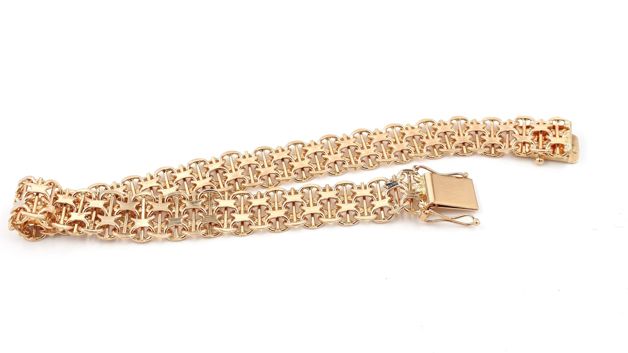 X-länk armband med stavar i 18k guld . vikt: 23,62g