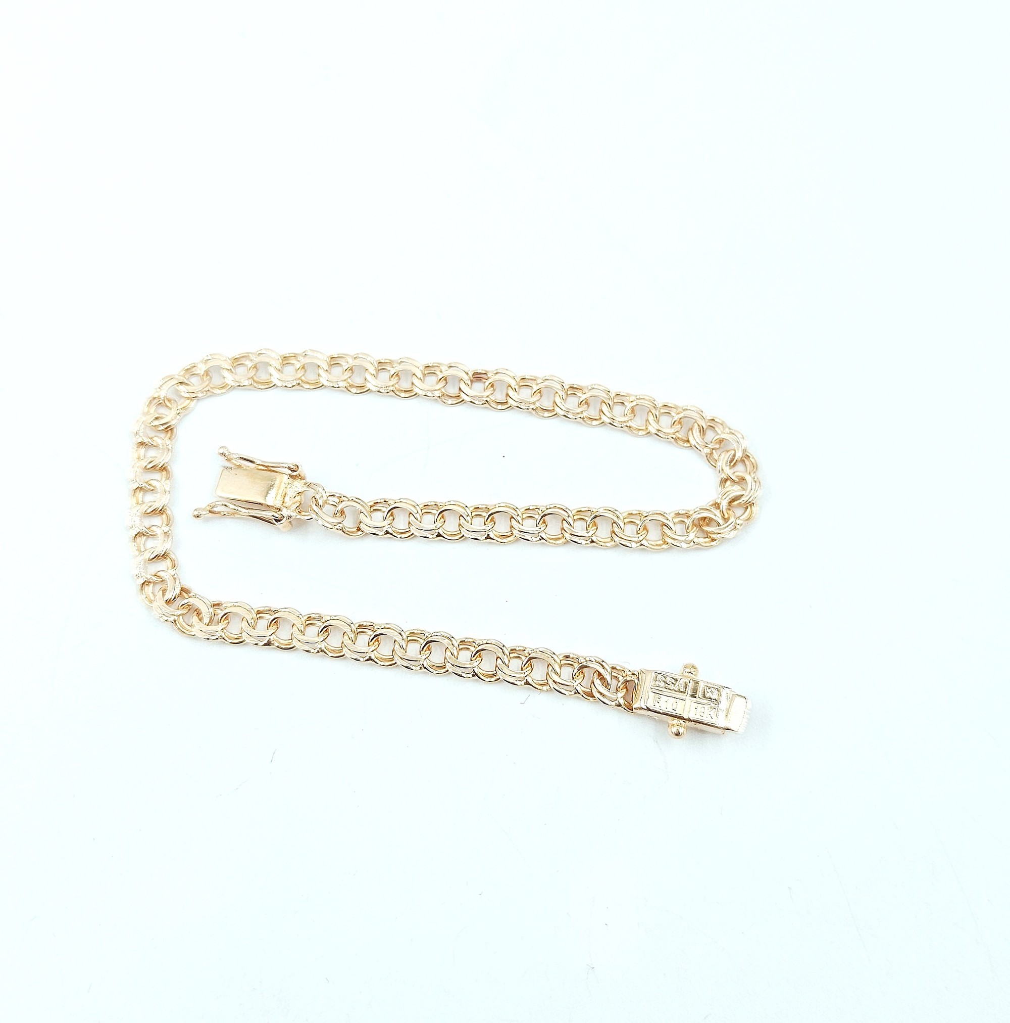 Bismarck armband i 18k guld- massiv . vikt: 5,7 g