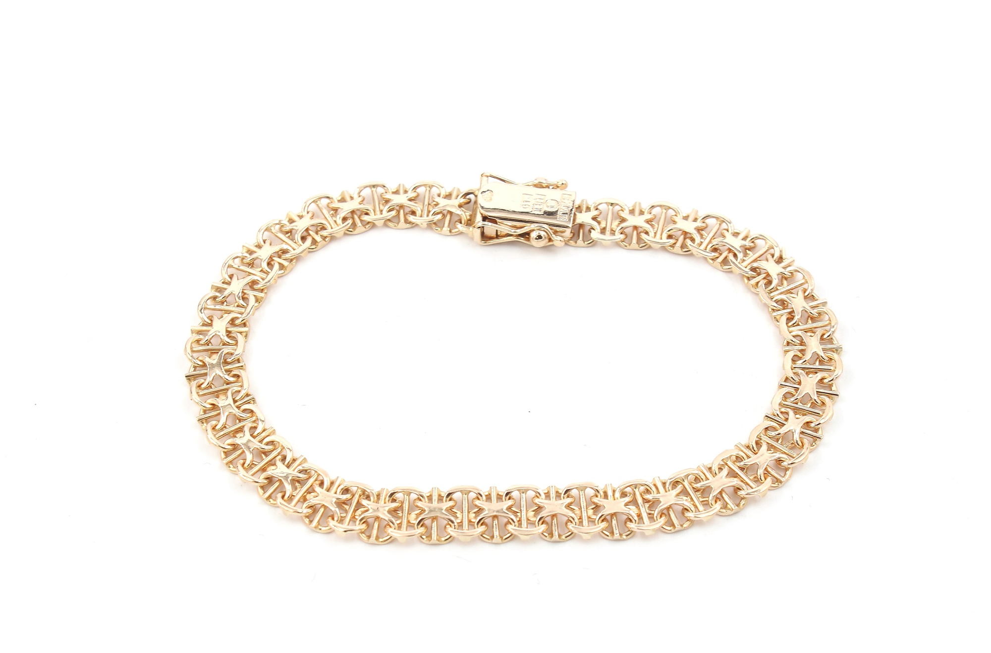 X-länk armband i 18k guld . vikt: 12,5g