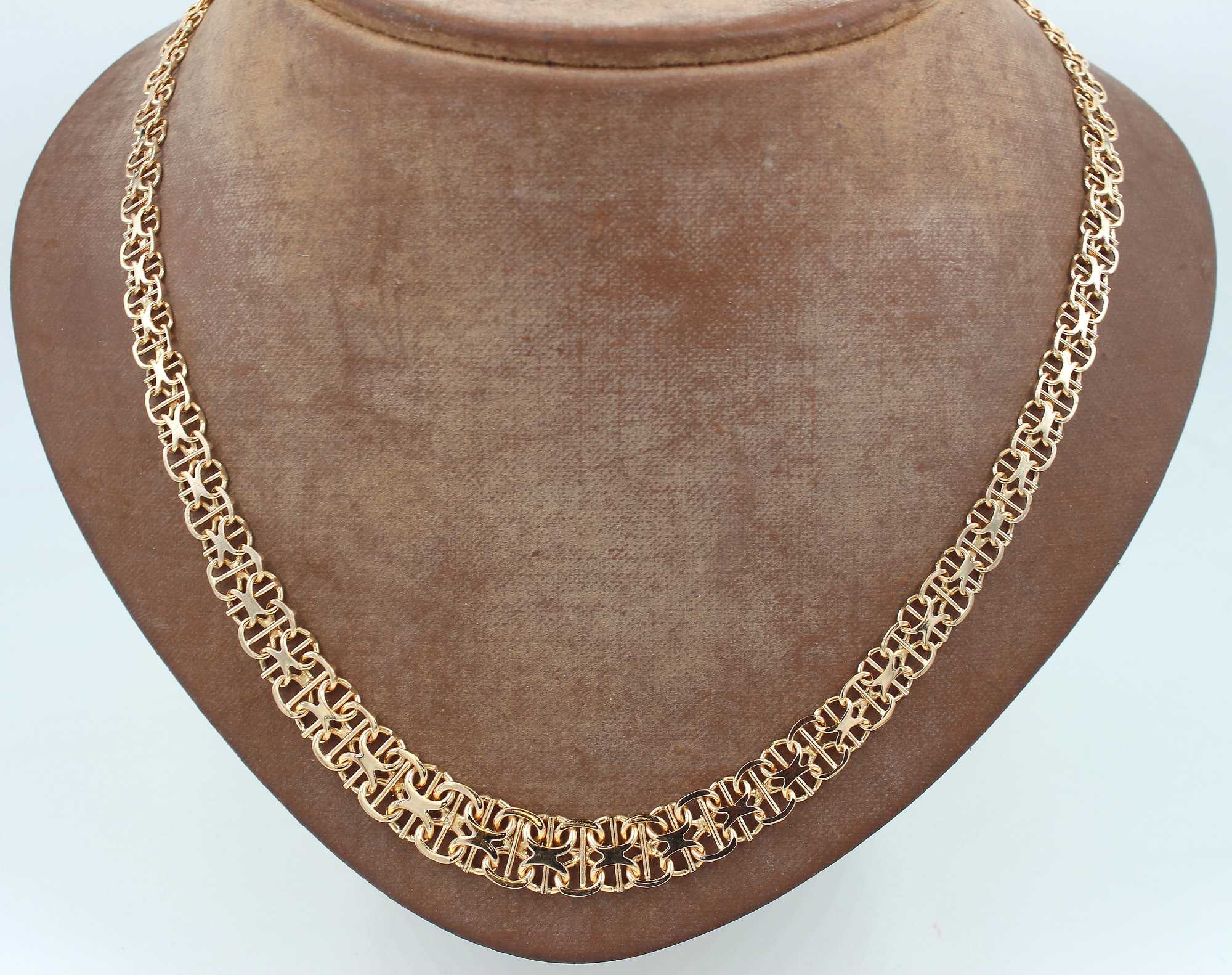 X-länk Halsband med stavar i 18k guld . vikt: 23,62g