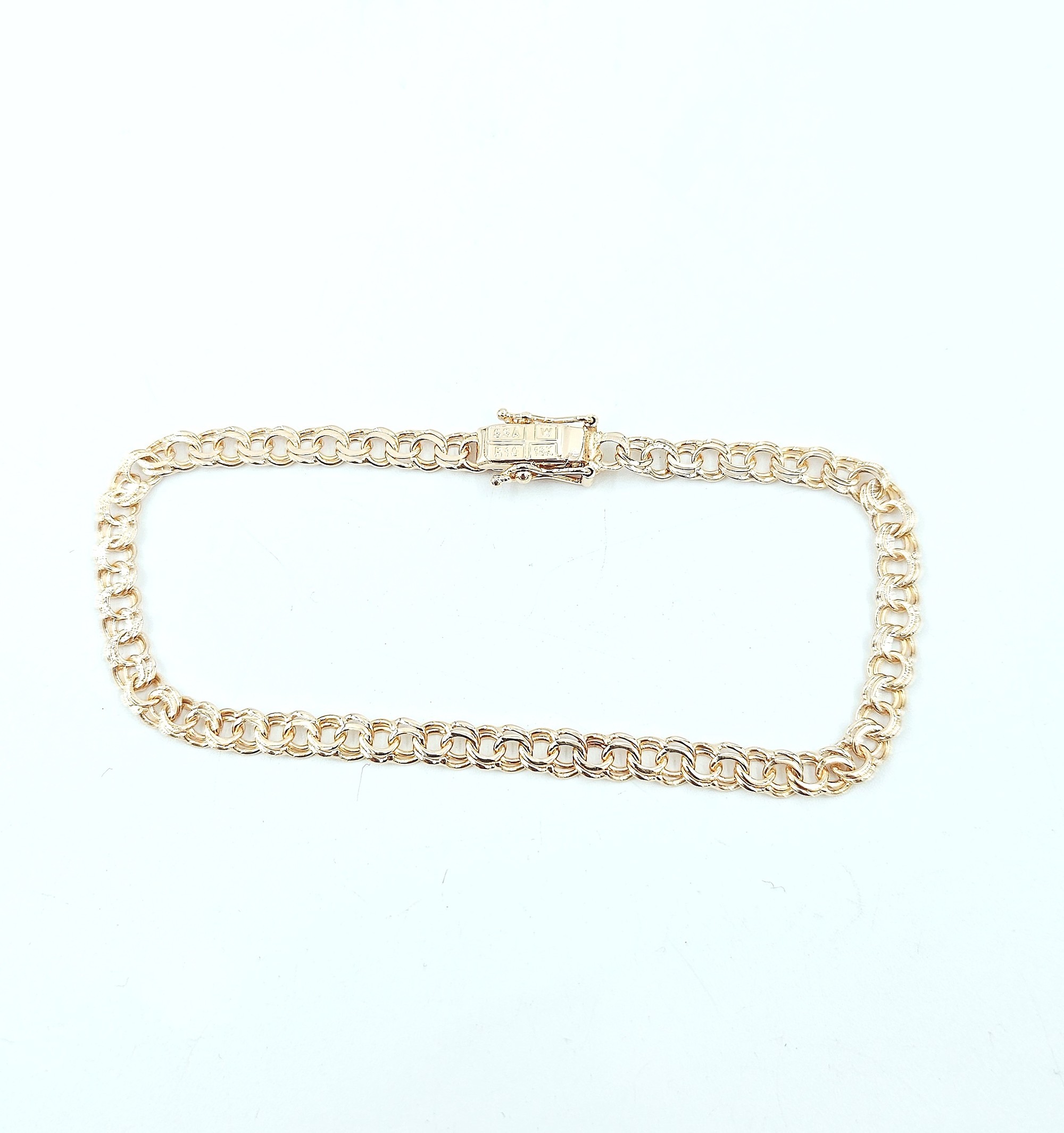 Bismarck armband i 18k guld- massiv . vikt: 5,7 g