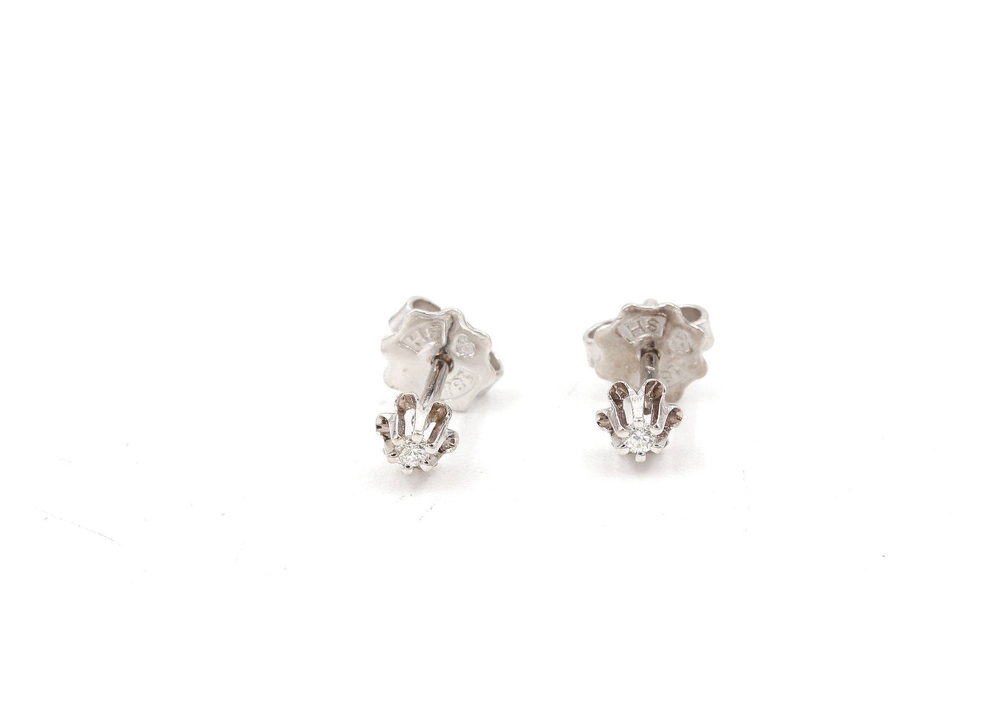 Diamant örhängen i 18k vitguld ca 0,04ct. vikt: 0,9g