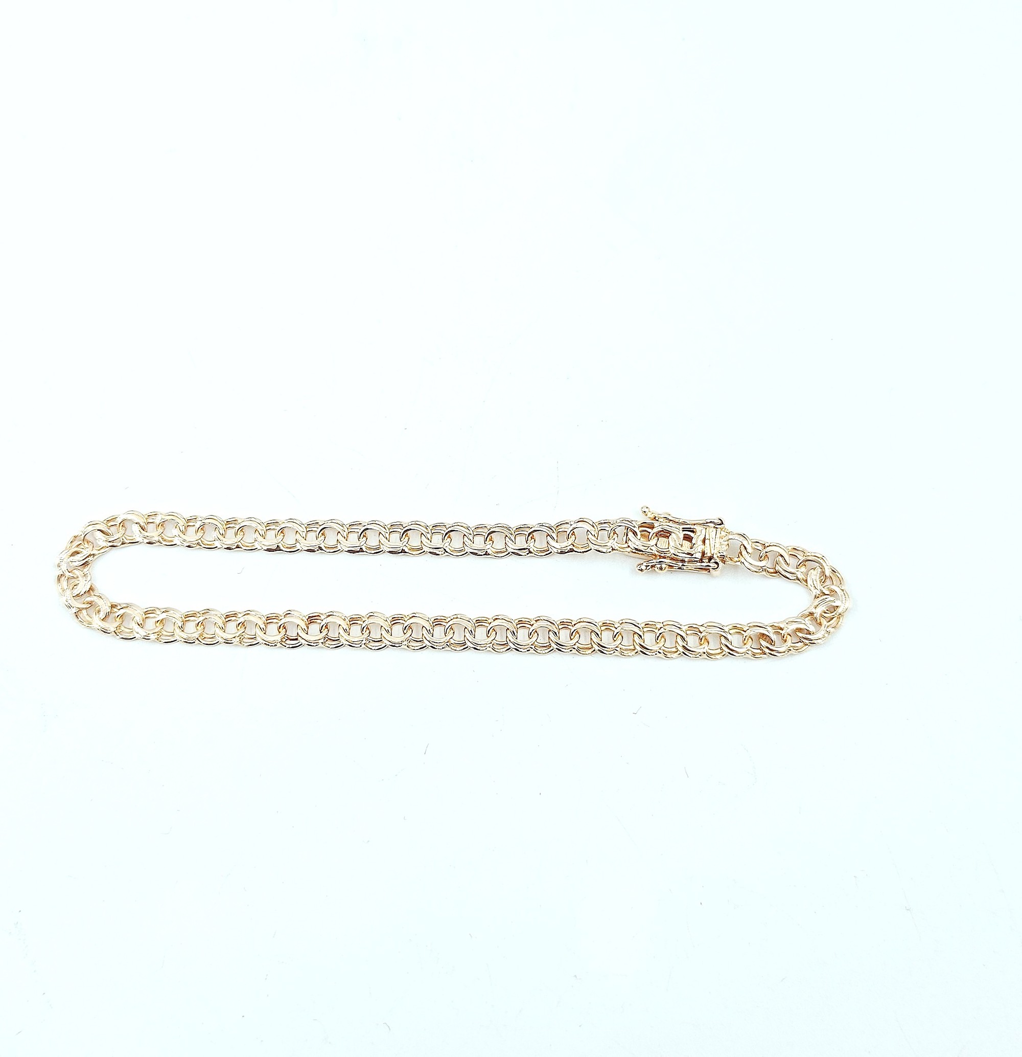 Bismarck armband i 18k guld- massiv . vikt: 5,7 g
