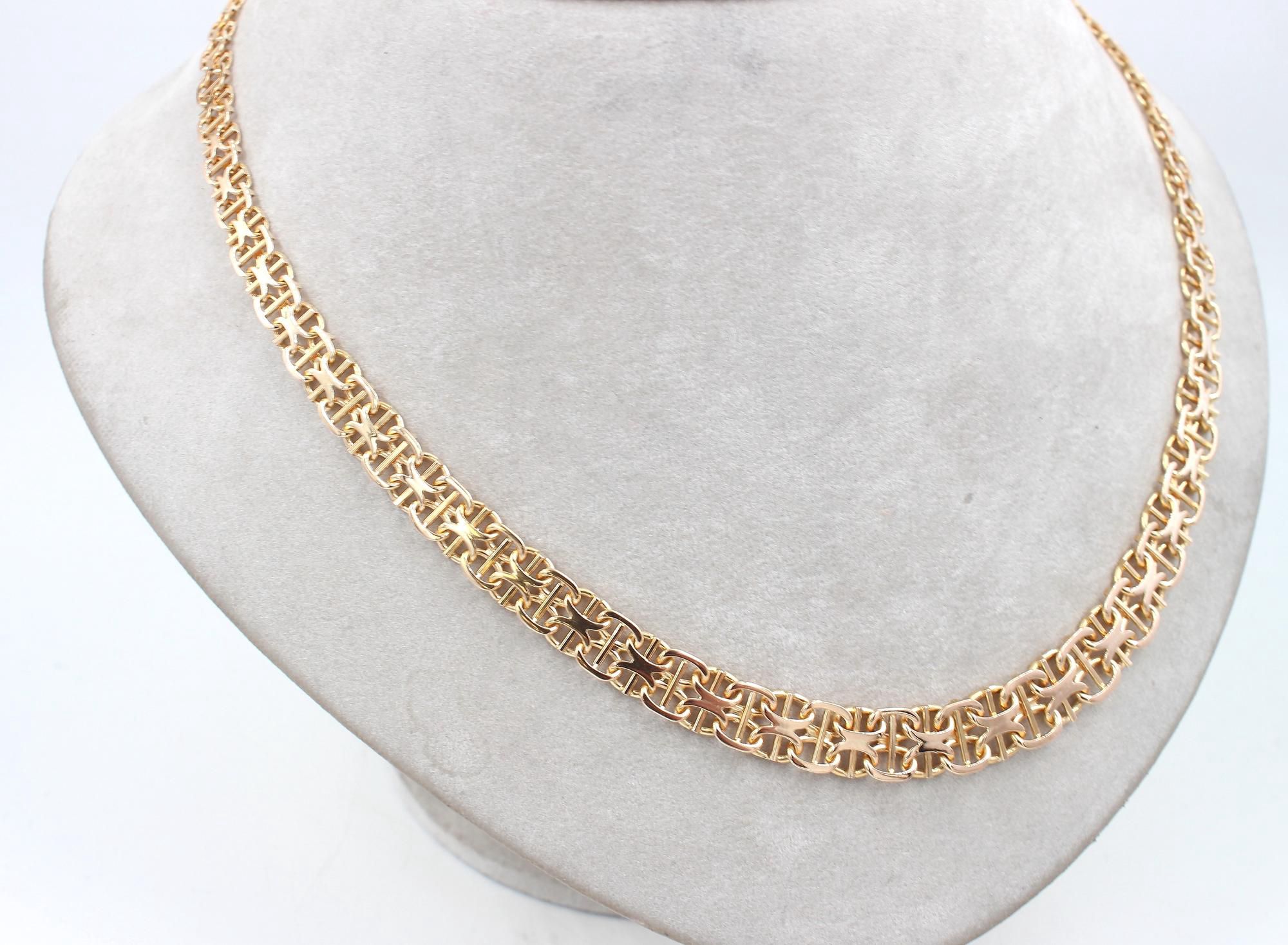 X-länk halsband med stavar i 18k guld. vikt: 25g