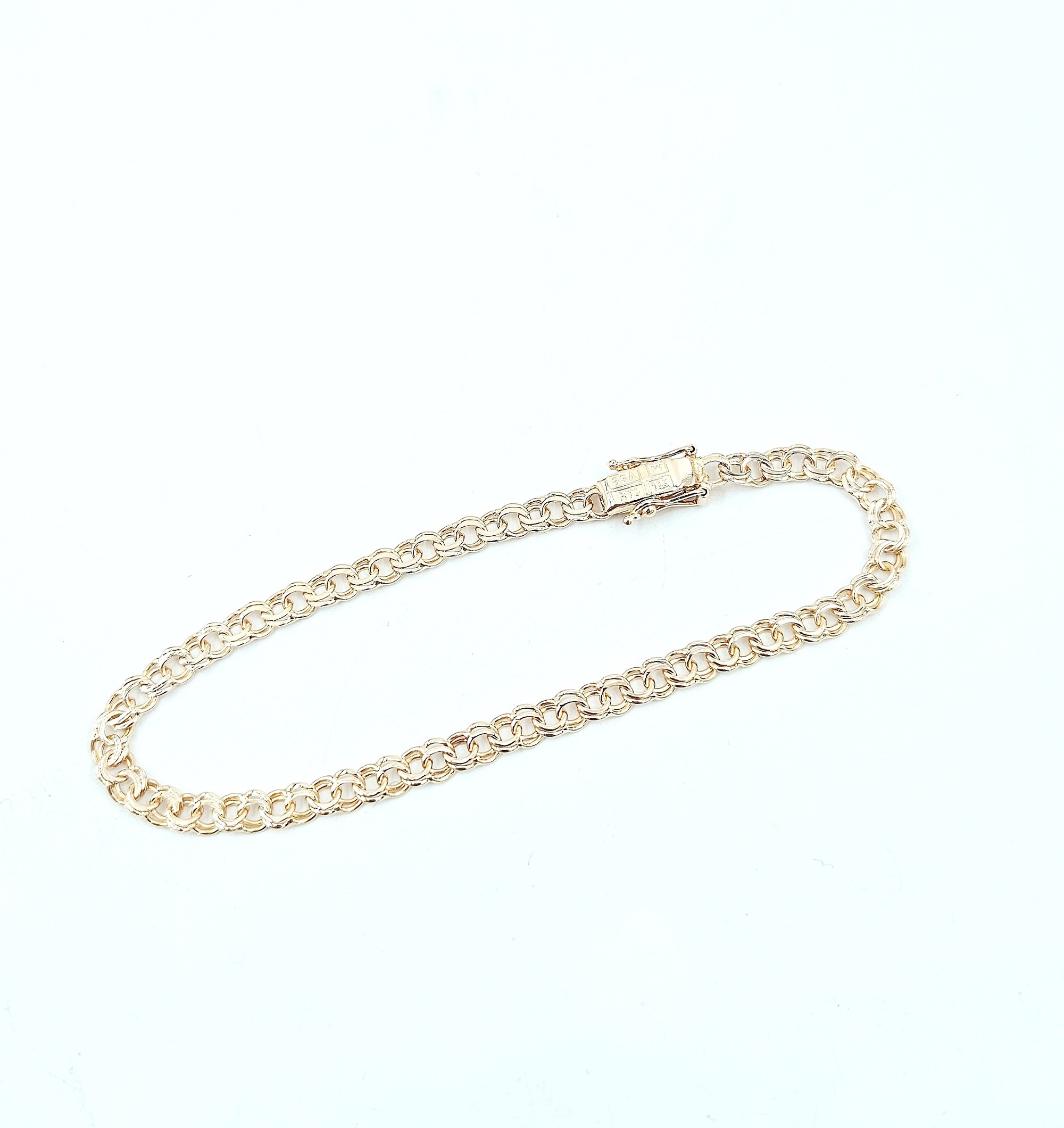 Bismarck armband i 18k guld- massiv . vikt: 5,7 g