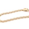 X-länk armband med stavar i 18k guld . vikt: 7,65g