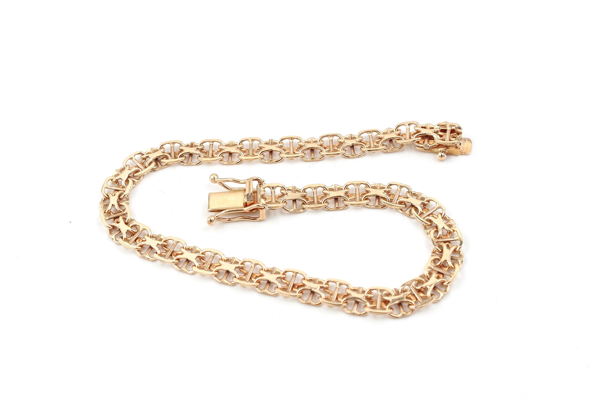 X-länk armband med stavar i 18k guld . vikt: 7,65g