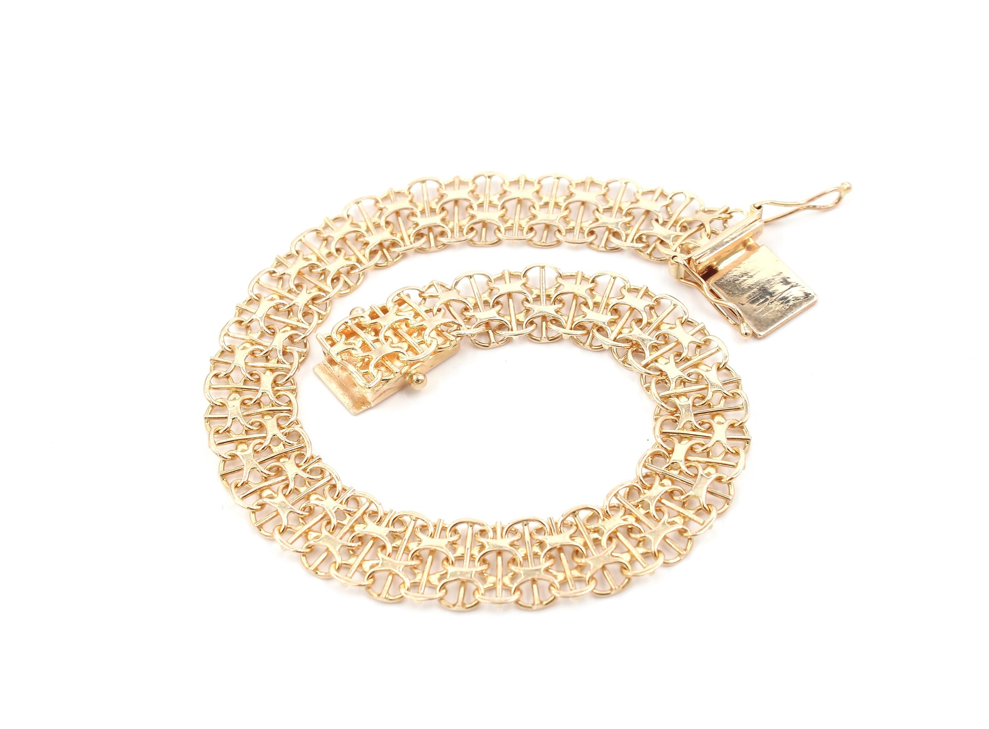 X-länk armband med stavar i 18k guld.